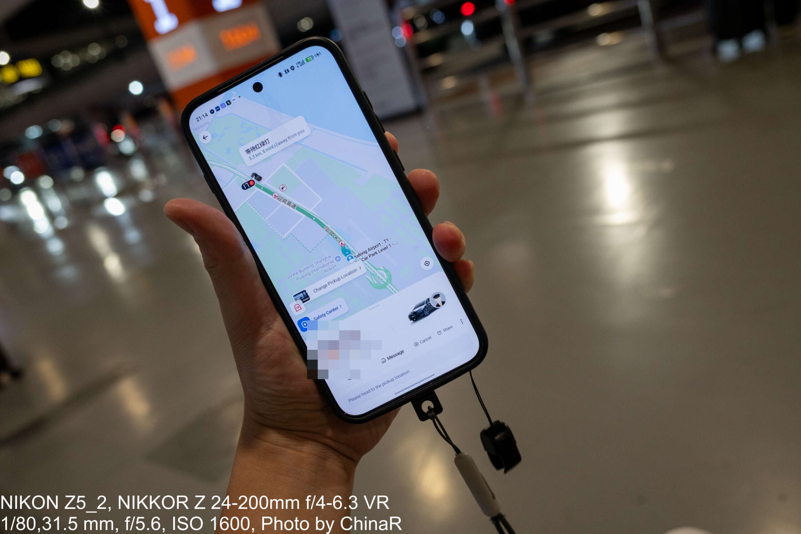 上海浦東空港でDidiの配車画面を表示したスマートフォン